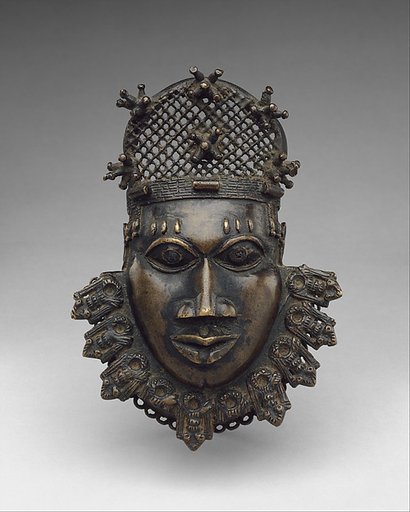 Hip ornament with face