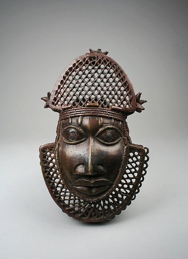 Hip ornament with face