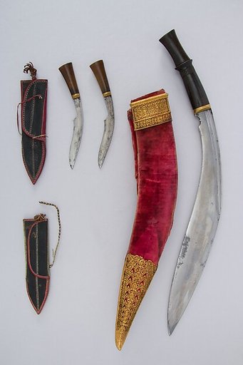 Knife (Kukri) with Two Sheaths, Two Small Knives, and Two Sharpening Pouches