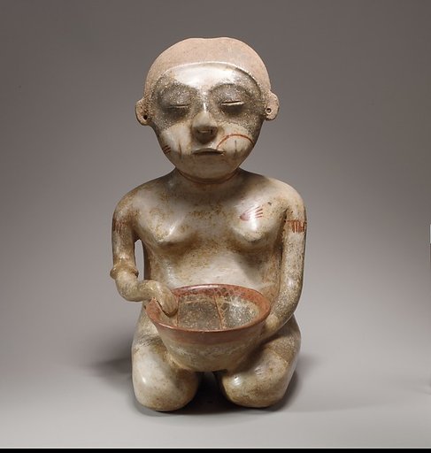 Kneeling female figure