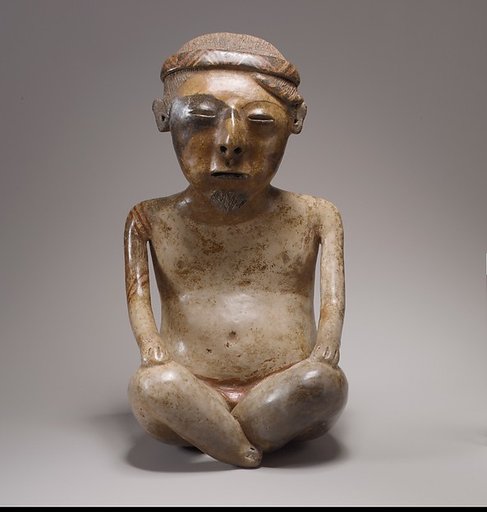 Seated male figure
