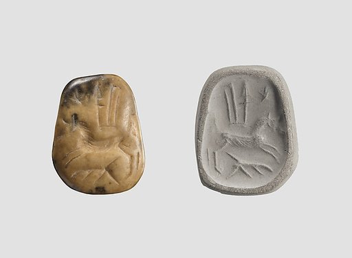 Stamp seal (octagonal pyramid, worn) with divine symbols