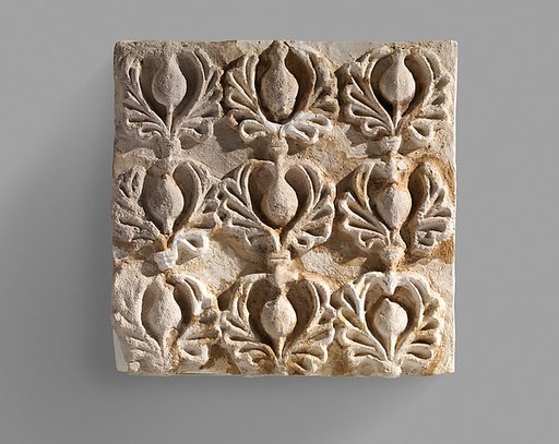 Wall decoration with pomegranates in palmettes