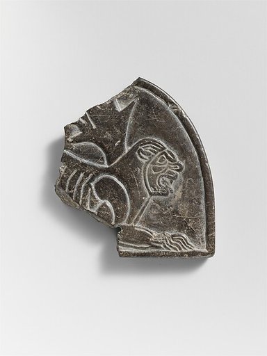 Plaque with the figure of a lion