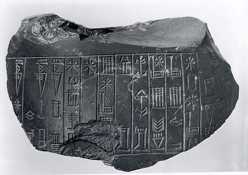 Statue fragment bearing incised cuneiform inscription of Amar-Sin