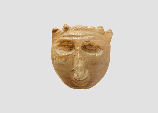 Demon-headed amulet