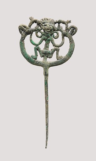 Openwork pin with a squatting female