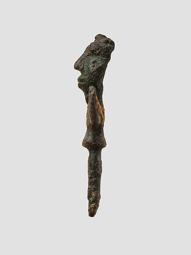 Head of a pin: human head and wings