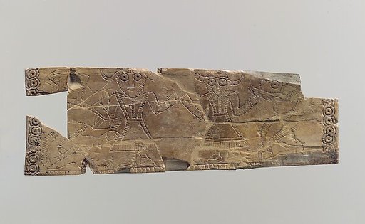 Plaque: bull-men on the obverse; lion attacking a horned animal on the reverse