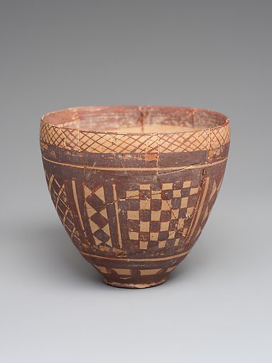 Cup with geometric decoration