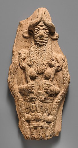 Molded plaque: bearded underworld god
