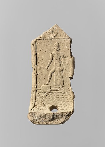 Part of a model chariot, with an impression of the sun god Shamash rising over the mountains