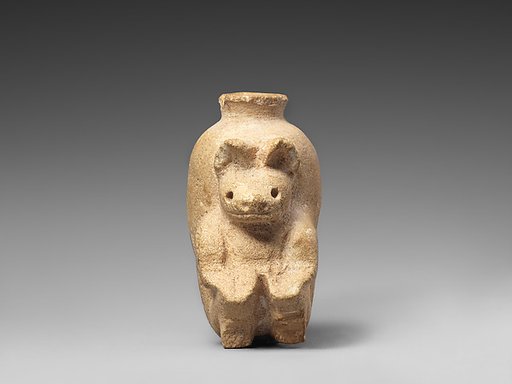 Jar with bear figurine