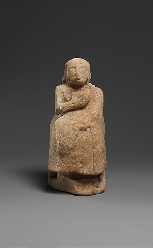 Seated female figure