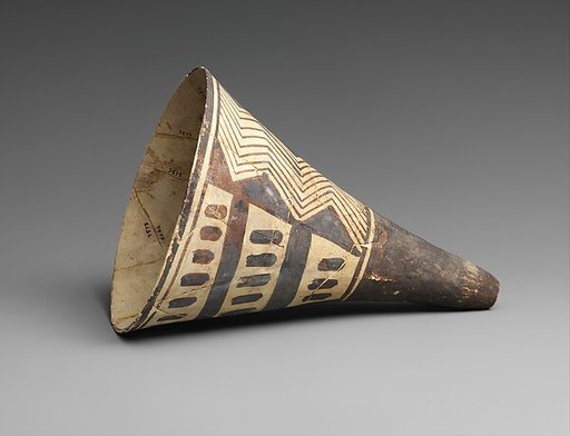Cone-shaped vase with geometric decoration
