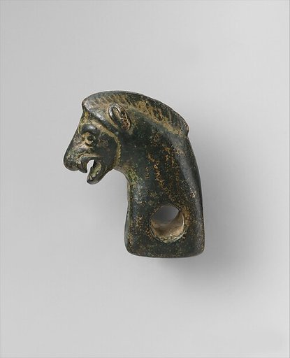 Harness or bridle fitting in the form of a boar's head
