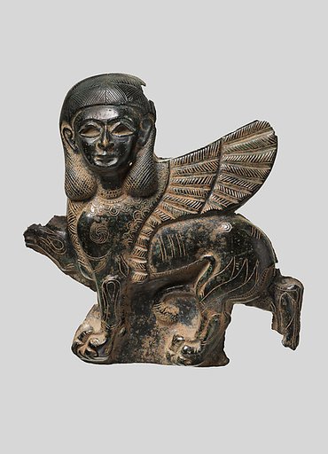 Plaque in the form of a sphinx