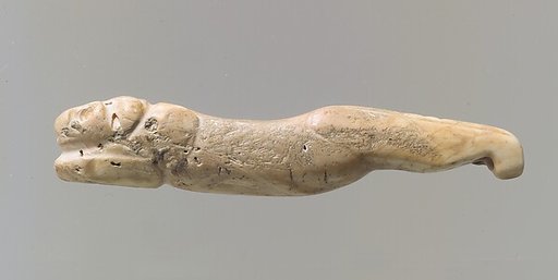 Amulet in the form of a lion with legs extended