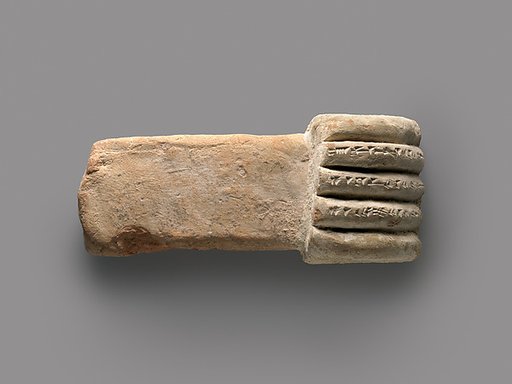Miniature corbel in the shape of a hand