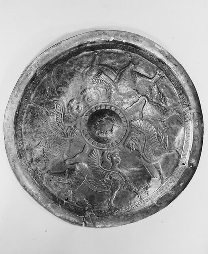 Disc with sphinxes and winged bulls