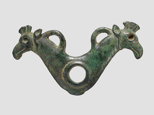 Horse bit cheekpiece in form of addorsed griffin heads