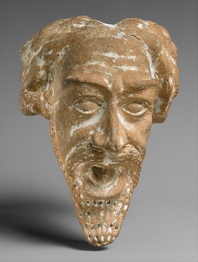 Spout in the form of a man's head