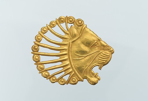 Applique in the shape of a lion's head