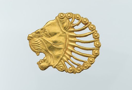 Applique in the shape of a lion's head