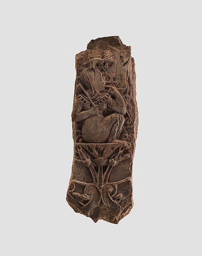 Cloisonne furniture plaque with an infant on a lotus flower