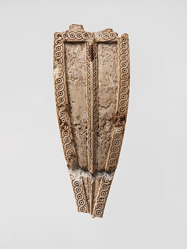 Horse frontlet with an incised guilloche design