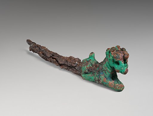 Pin in the form of a lion