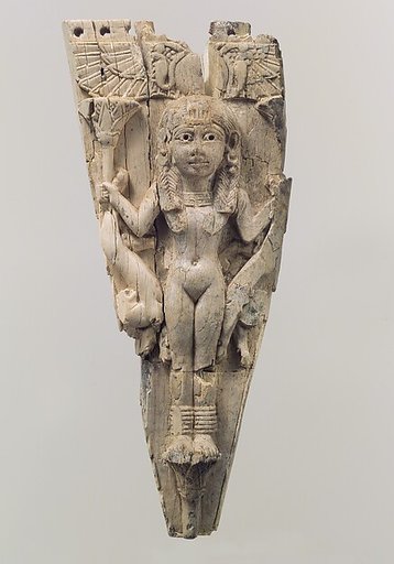 Horse frontlet carved in relief with a female figure flanked by lions