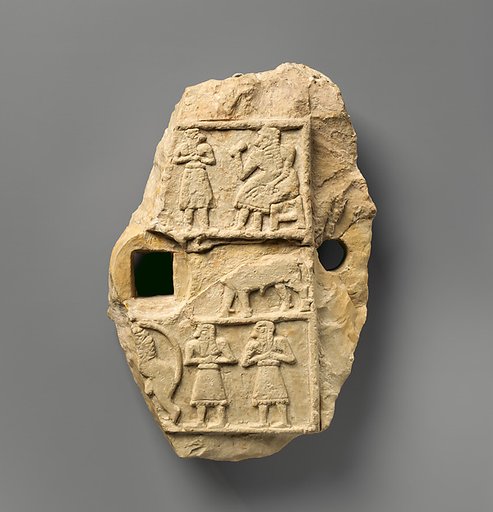 Relief plaque with a banquet scene