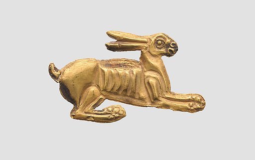 Inlay for a plate in the form of a hare
