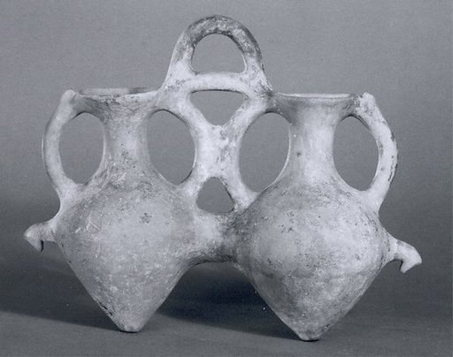 Double vessel with pierced bases