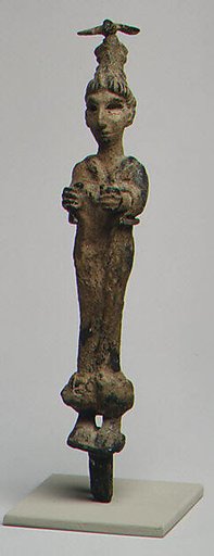 Goddess wearing a headdress surmounted by a bird