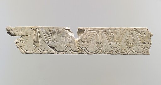 Incised furniture plaque with a frieze of lotus blossoms and buds