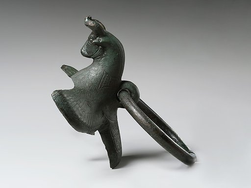 Cauldron attachment: winged bull's head
