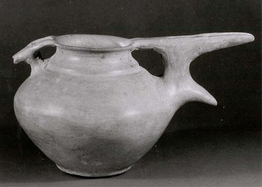 Bridge-spouted pitcher