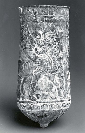 Beaker with winged human-headed bulls flanking a stylized tree