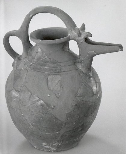 Bridge-spouted jar