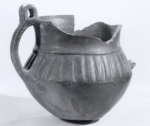 Handled "palace ware" pot