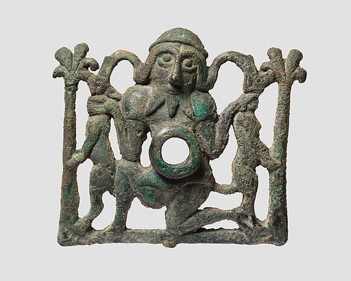 Horse bit cheekpiece in form of a kneeling hero