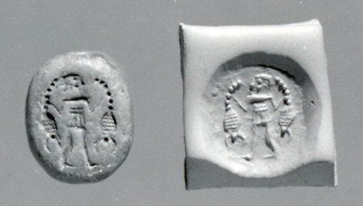 Stamp seal (ovoid) with three-figure contest scene
