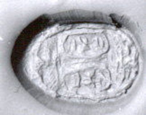 Stamp seal (ovoid, in grooved mount with loop handle) with cartouches