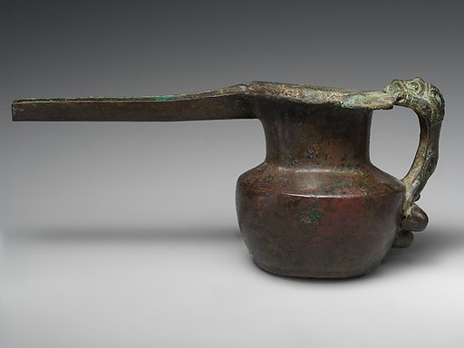 Spouted vessel with lion-shaped handle