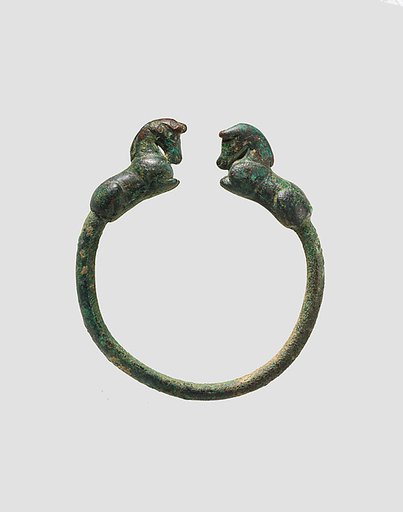 Bracelet with horses at terminals