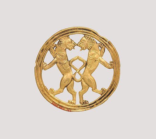 Ornament with back-to-back lions