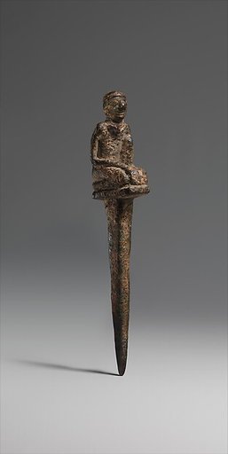Peg with kneeling male