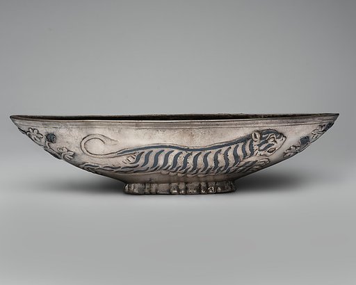 Oval bowl with running tigresses on each side